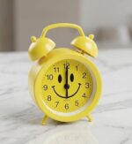 Cute Smiley Face Yellow Alarm Clock – Decorative Desktop Twin Bell Style Clock for Kids And Home Decor